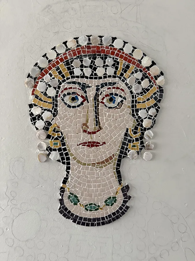 Close-up of glass tesserae with subtle iridescence.